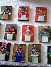 Calamite mosaico e perle, montato su legno 5x7cm.