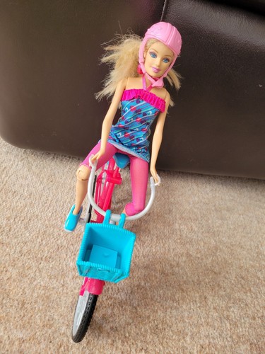 Barbie bambola con bicicletta