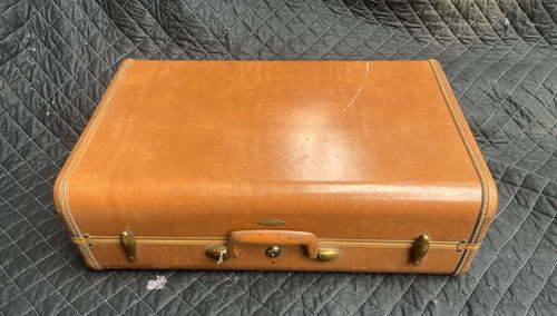 Valigia rigida marrone vintage