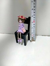 Vintage miniature chair girl