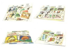 04 Buste da 100 francobolli a tema Cani, Gatti, Animali Preistorici, Animali