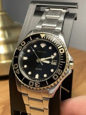 Seiko SQ100 Diver bicolore oro
