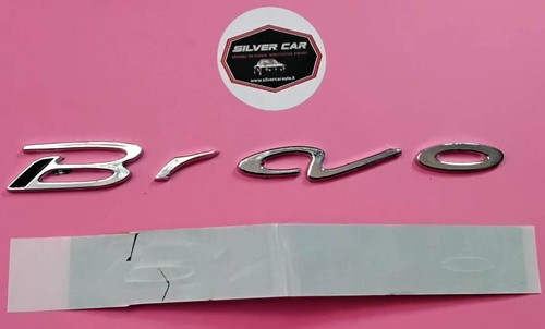 Scritta posteriore argento - , e