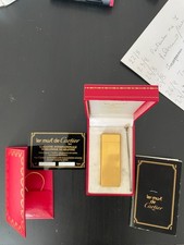 ACCENDINO CARTIER PLACCATO ORO BUONO STATO D'USO