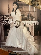 abito da sposa bianco tg 42/44 usato con una piccola macchia sul fondo sottana