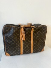 Valigia Louis Vuitton Monogram 70 Sirius vintage anni 70 con etichette Dayton