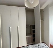 74620 Armadio bianco 6 ante con le ante centrali scorrevoli a libretto