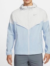 Giacca a vento NIKE blu/bianco