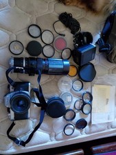 Nikon FM ANNI 90. Completa di grandangolo e teleobiettivo. Filtri vari. Flash. 