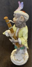 Statuina giacca gialla fagotto Meissen Monkey Orchestra dal Giappone