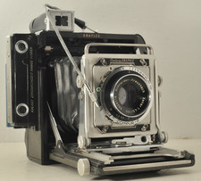 Fotocamera Graflex Century Graphic 2x3 con obiettivo Xenar 105 mm 4,5 e supporto pellicola RH/10