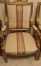 Coppia di poltrone dorate