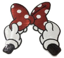 Mano di Topolino con fiocco