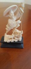 Antica Statuetta in Avorio con base in ebano.