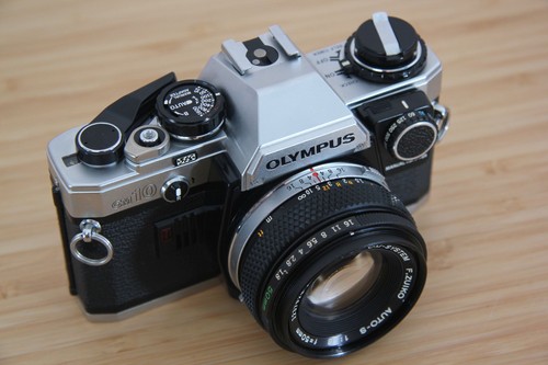 Olympus 10 con - om, fotocamera