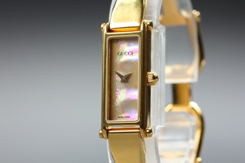 Gucci 1500 shell dial gold - gucci,