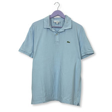 Polo Lacoste azzurra a tinta