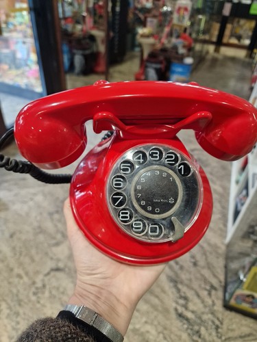 Telefono rosso disco vintage - a,