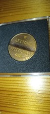 Gettone telefonico 7809
