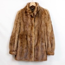Giacca in visone Pelz Knogl  lavorazione a trasporto colore miele da donna