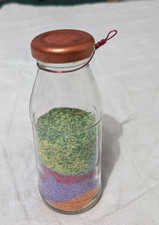 BOTTIGLIA DI VETRO RIEMPITA DI