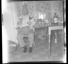 OLD MAN SITTING IN CHAIR