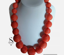 COLLANA IN TESSUTO CON PALLINE