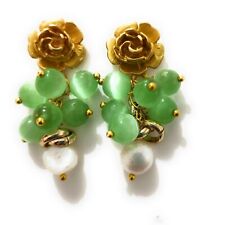 orecchini stella in Zama a fiore con pietre occhi di gatto  e perle bianche