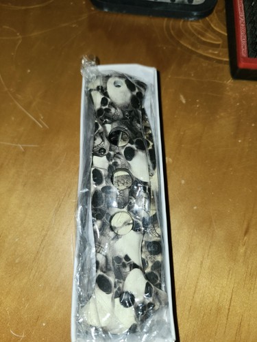 Coltello teschio acciaio