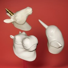 3 statuine o ganci bianchi