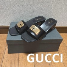 Sandali bassi Gucci neri con hardware dorato taglia 36,5 US circa 6,5 da donna