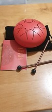 Tamburo d'acciaio (steel tongue drum) rosso con custodia, bacchette e libretto