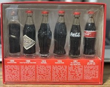 Bottiglia Coca Cola Evoluzione Del Contorno 6 Mini Bottiglie Vetro Da Collezione