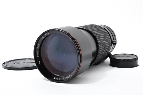 Tokina 200 mm - x,