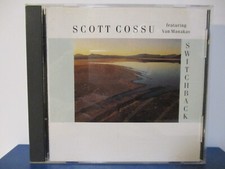 Scott Cossu, Van Manakas -