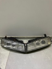 FARI ANTERIORI OPEL CALIBRA TURBO MADE IN GERMANY (137124-00 ) COPPIA FARI HELLA