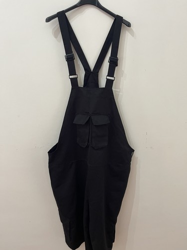 Tuta nera con - , bretelle