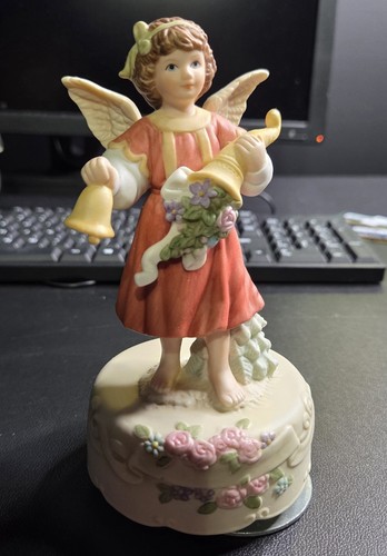 Statuina angelo porcellana