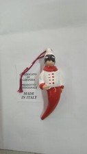 Pulcinella con corno in