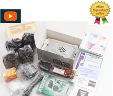 con obiettivo TLA200 [quasi