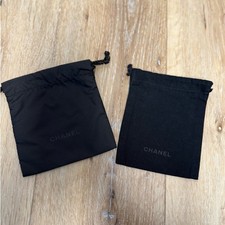 CHANEL Elegant Black Pouches