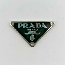PRADA LOGO TARGHETTA SIMBOLO BEDGE ORIGINALE TRIANGOLO ORIGINALE MIS 22x22x30 MM