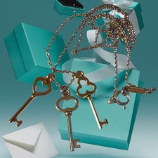 Collana con ciondolo a tripla chiave in argento oro 18 kt Tiffany & Co.
