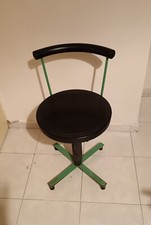 sedia vintage in ferro e pelle