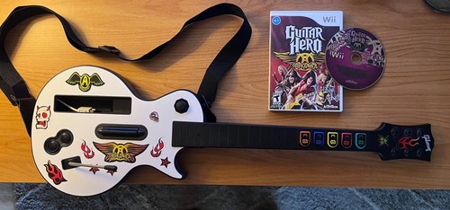 Nintendo wii guitar hero - wii, les