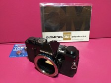 1973 olympus black om1 - olympus,