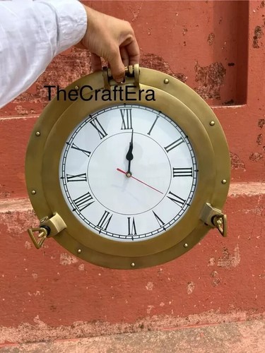 Orologio con oblò - orologio, ottone