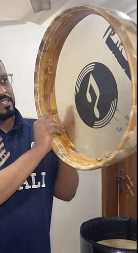 Strumento percussione - a,