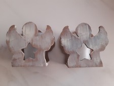 Coppia di porta candele a forma di angioletti in legno e vetro