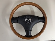 Volante in legno a tre razze